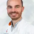 Dr. Chris van den Akker